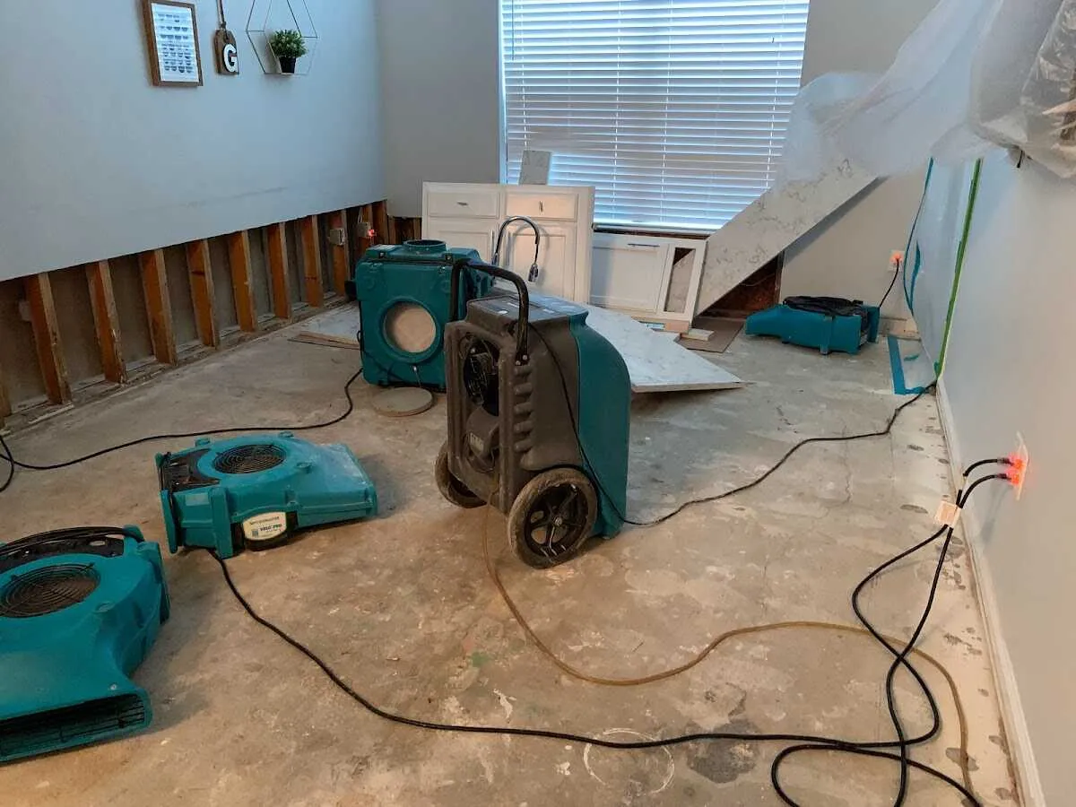Dehumidifier in flood-cut room for Water Damage Restoration in Raleigh Hills